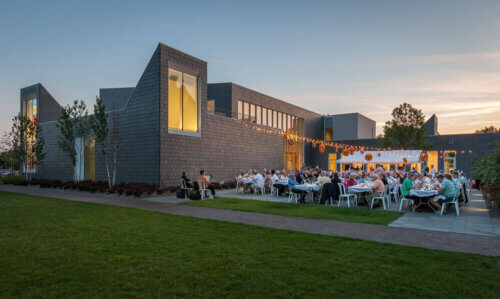 American Swedish Institute during a summer event at dusk