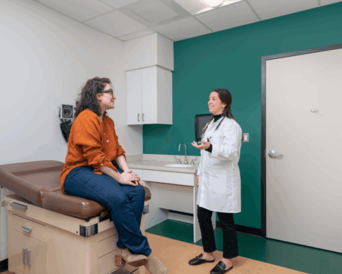 Patient being seen by a doctor at Israel Lahey Health at Lahey Hospital & Medical Center