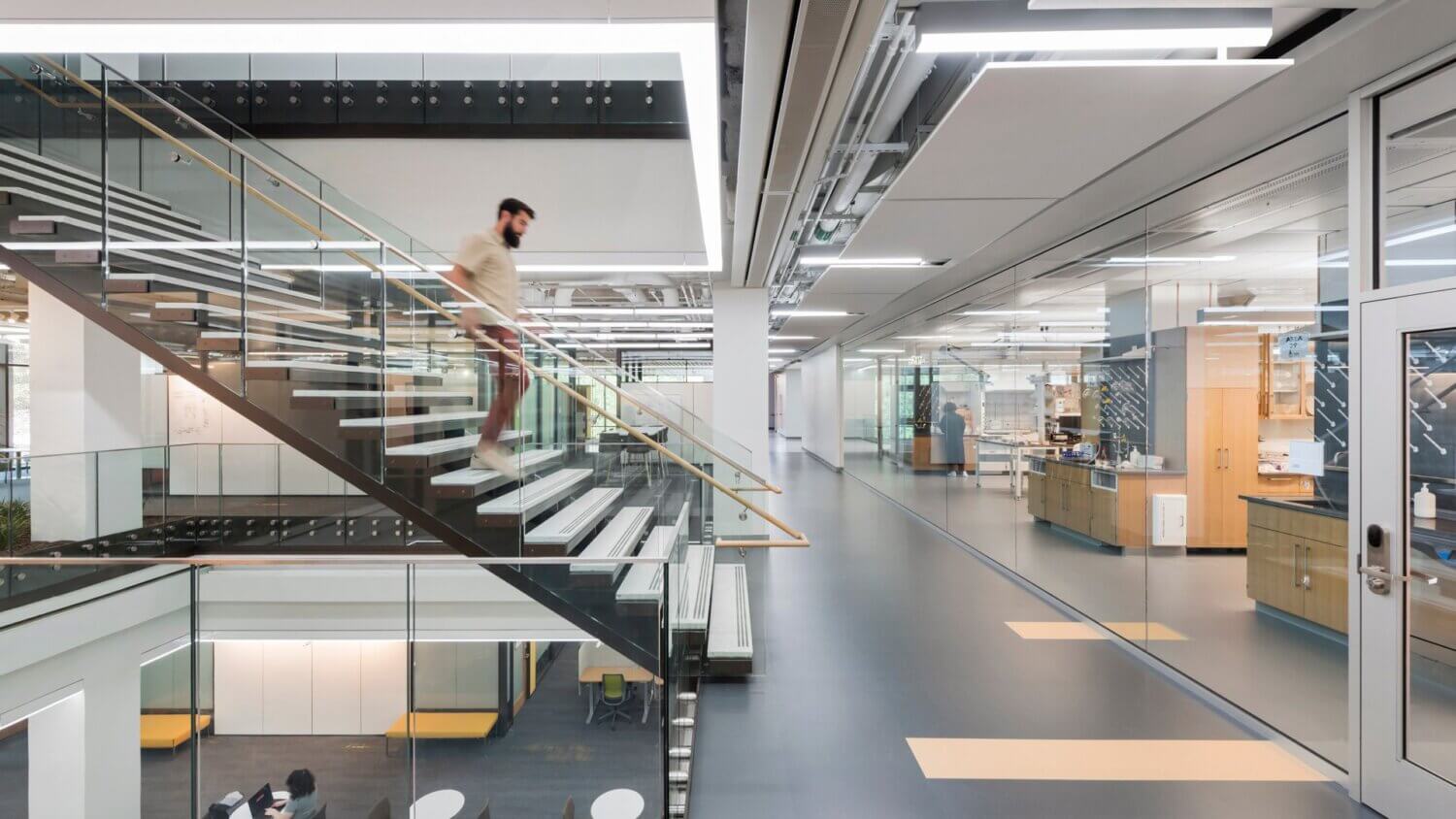 Lehigh Staff member going down the steps in the HST building
