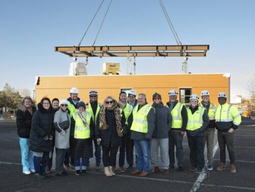 HGA team and partners celebrate placement of STAAT MOD at M Health.