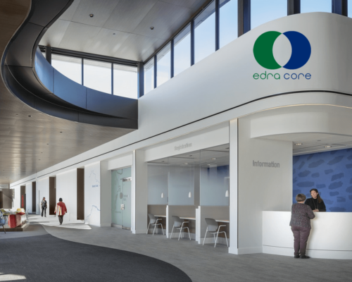 Hospital lobby overlaid with the Edra Core logo