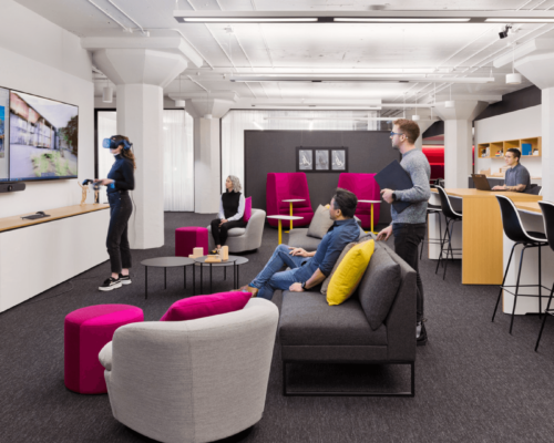 Employees watching a virtual rituality experience at the HGA Minneapolis office